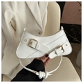 Close-up of white crescent underarm bag with decorative metal buckles and knot strap - White