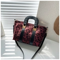 Vintage leopard print crossbody bag with red and black suede finish and gold metal hardware - Red