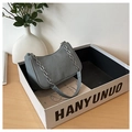 Detailed view of grey herringbone hobo bag with silver chain strap and fabric handle - Blue