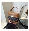 Detail view of vintage brown monogram box bag with gold double zippers and leather handle - Brown