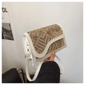 White leather shoulder bag with wave embroidery and asymmetric saddle flap design - White