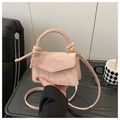 Detail of light pink marble texture handbag with unique knotted handle and slim strap - Small / Pink