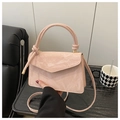 Detail of light pink pleated handbag with V-flap and elegant decorative handle knot - Large / Pink