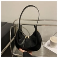 Minimalist black crescent shoulder bag with golden hardware and polished leather finish - Black