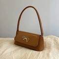 Chic brown baguette shoulder bag with a vintage golden bow buckle accent - Brown