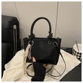 Minimalist black faux leather tote bag with round handles and woven pendant charm - Black With Pendant