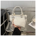 White faux leather handbag with rope handles and a tennis racket charm accessory - White With Pendant
