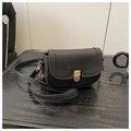 Bolso bandolera de piel negra con textura de lichi y cierre de metal dorado chic - Negro