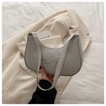 Silver-gray shoulder bag with metallic bow detail and shimmering textured finish - Silver