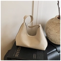 Minimalist beige woven tote bag with crescent shape and smooth zipper closure - Beige