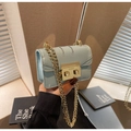 Mini light blue crossbody chain bag in smooth faux leather with gold square clasp lock - Blue