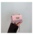 Pink quilted crossbody bag with V-shaped stitching and golden metal chain strap - Pink