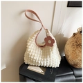 Chic beige popcorn fabric tote bag with pink leather strap and flower pendant detail - White and Pink