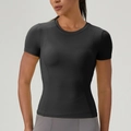 Damen Sport-T-Shirt in Tiefschwarz, eng geschnitten für Yoga mit formenden Nähten - S / Schwarz