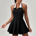 Abito da tennis nero all'americana per donna con colletto polo bianco e gonna a pieghe - S / Nero