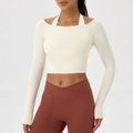 Top da yoga a maniche lunghe color panna con spalle scoperte in tessuto elastico - S / Bianco Mandorla