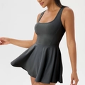Sleeveless black tennis sports dress with racerback design and pleated flared skirt - S / Dresses / Black