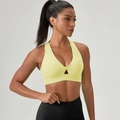 Bright yellow sports bra with front twist detail and breathable cutout for fitness - Pudding Yellow