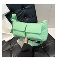 Light green quilted nylon crossbody bag with dual front pockets and wide strap - Green