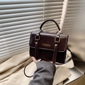 Elegant vintage dark brown faux leather crossbody bag with gold FASHION lettering - With Pendant / Brown