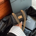 Elegant black glitter sequin crossbody bag with gold chain strap and metal lock - Black