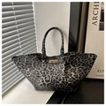 Large leopard print tote bag with gold metal plate detail and round dual handles - Black