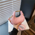 Pink crescent saddle bag in faux leather with gold buckle and adjustable strap - Pink