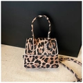 Detailed view of leopard print mini square bag with contrast piping and patterned strap - Khaki