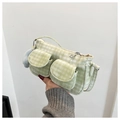 Detail of light green corduroy shoulder bag with vertical texture and plush ball charm - With Pendant / Green