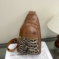 Brown faux leather sling bag with leopard print pocket and adjustable shoulder strap - Brown