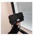 Detail of black tweed crossbody bag with fringe texture and silver twist lock mechanism - Black