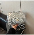 Detailed macro of silver quilted tote with diamond stitching and golden twist lock - Silver (No Pendant)