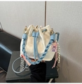 Creamy white drawstring bucket bag with blue woven strap and cute decorative charms - White With Pendant