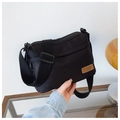 Minimalist black nylon crossbody bag with waterproof fabric and multi-layer zippers - Black