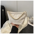 Detail of cream white nylon shoulder bag with golden chain handle and fashion logo plate - White Without Pendant