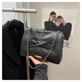 Fashionable black bow shoulder bag in oil wax leather with silver chain strap - Black