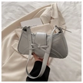 Bolso de hombro plateado minimalista con acabado metálico y elegante adorno de lazo - Plateado