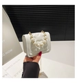 Detail of white heart-quilted crossbody bag with pearl handle and gold chain strap - White