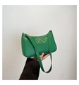 Green leather baguette shoulder bag with silver bow accent and minimalist strap - Green
