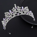 Elegant silver tiara with purple teardrop crystals and white rhinestones on black background - Silver Purple Stone