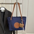 Waterproof nylon tote bag in deep blue with brown handles and a cute bear charm - Large / With Pendant / Dark Blue