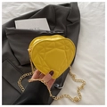 Bright yellow heart-shaped crossbody bag with quilted diamond pattern and gold chain strap - Yellow