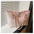 Pink quilted tote bag with colorful wavy embroidery and leather logo tag for women - Pink