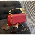 Red leather handbag with unique oversized golden safety pin handle and chain strap - Burgundy