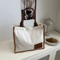 Minimalist cream waffle texture canvas tote bag with brown straps and leather patch - White