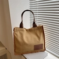 Minimalist yellow corduroy tote bag with brown handles and large storage capacity - Khaki