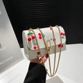 White rectangle flap bag with red cherry print, gold chain and cherry charm accessory - White With Pendant