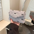 Grey corduroy chain shoulder bag with black bow print and gold metal trim detail - Bow Grey