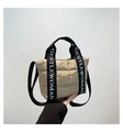 Close-up of beige quilted puffer tote bag with GENTLEWOMAN letter print straps - Khaki