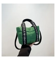 Detail of green quilted puffer tote bag with GENTLEWOMAN lettered canvas strap - Green